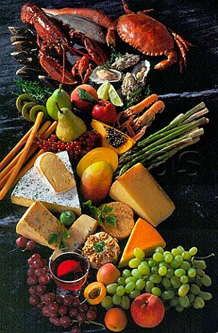 Assorted seafood and cheeses with fresh fruit and  wine etc