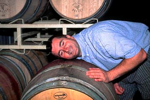 John C Abbott winemaker listening to   his Merlot fermenting in barrique Walla Walla   Washington USA   Walla Walla AVA