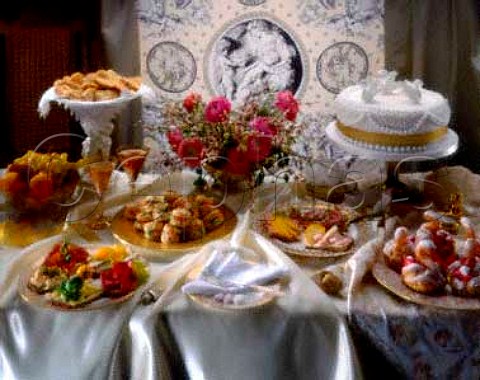Wedding Buffet  Iced Wedding Cake Choux pastry  swans Petit Palmier open sandwiches smoked salmon  scones champagne etc