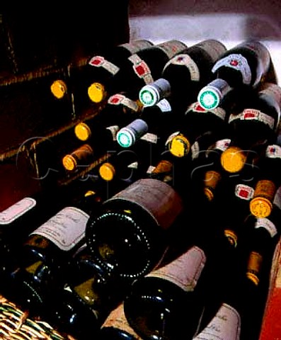 Wine stored in bins in the cellar of a house