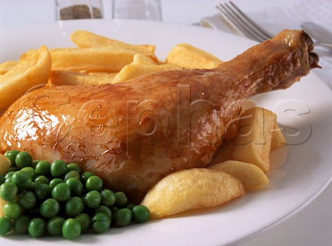 Chicken and chips with peas