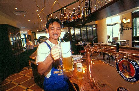 Serving in microbrewery   Beijing China
