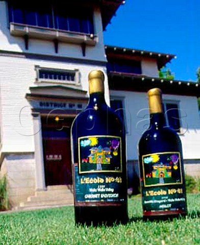 Bottles of LEcole No41 and the historic Frenchtown school which houses the winery  Lowden Washington USA  Walla Walla Valley