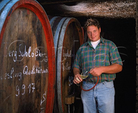Johannes Leitz of Weingut Josef Leitz sampling wine   from cask in his cellars at Rdesheim Germany       Rheingau