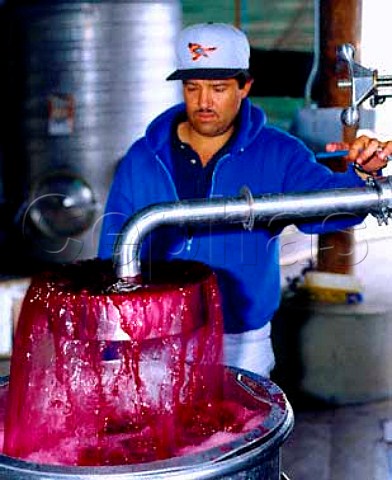 Aerating free run Cabernet Sauvignon wine after it   has finished fermenting at Robert Mondavis   Carneros Winery Napa California