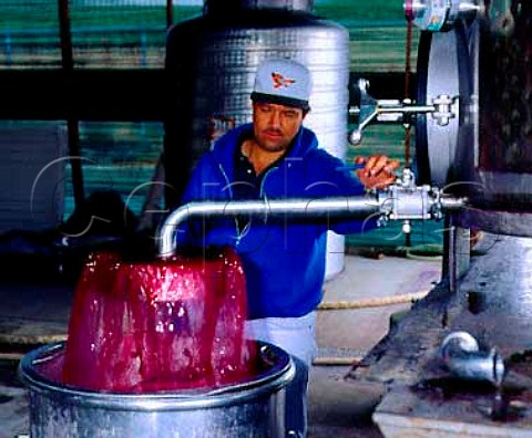 Aerating free run Cabernet Sauvignon wine after it   has finished fermenting at Robert Mondavis   Carneros Winery Napa California