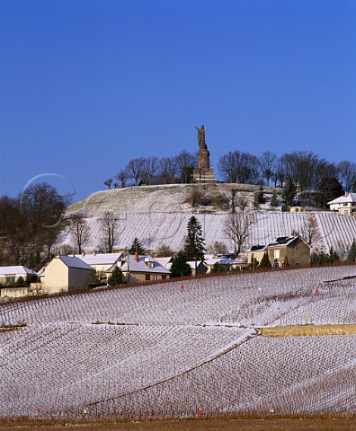 ChatillonsurMarne and snowcovered vineyards overlooked by the huge statue of Pope Urbain II Marne France Valle de la Marne  Champagne