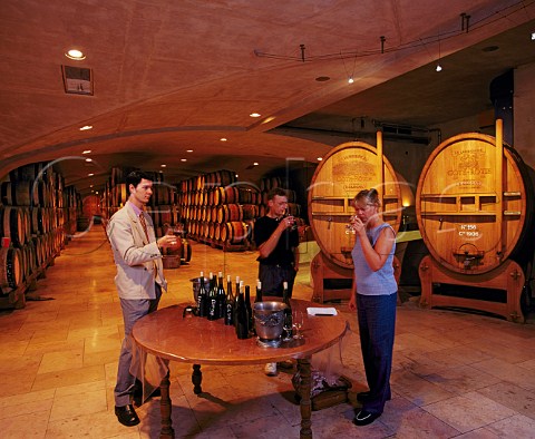 Philippe Guigal conducting a tasting in the   Cathedral Barrel Cellar of E Guigal   Ampuis Rhne France