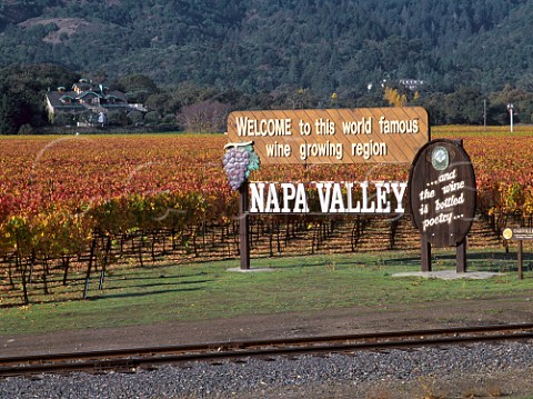 Napa Valley Welcome sign with Far Niente winery   beyond Oakville Napa Co California
