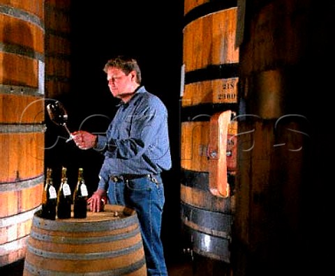 Rob Hunter winemaker examining his new Cabernet   Sauvignon from barrel  Sterling Vineyard Calistoga   Napa Co California