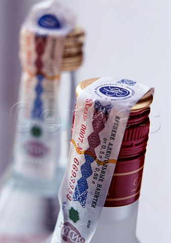 Tops of Russian Vodka bottles