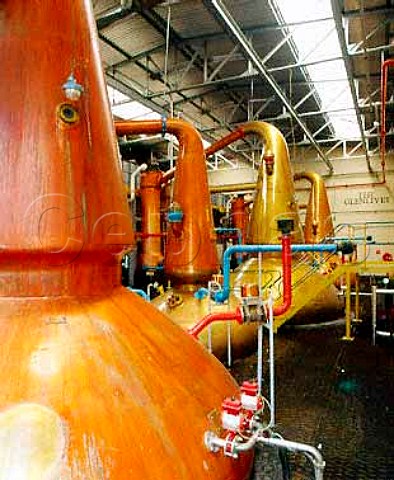 Copper pot stills of the Glenlivet whisky   distillery Ballindalloch Banffshire Scotland