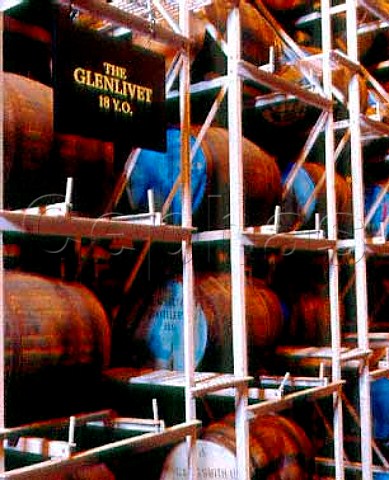 Casks of whisky maturing in a traditional warehouse   of the Glenlivet distillery Ballindalloch   Banffshire Scotland   Speyside