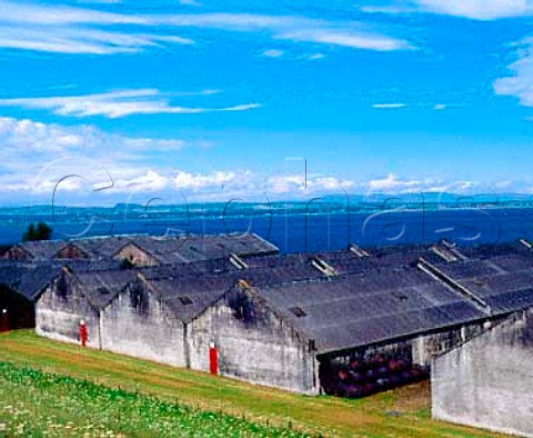 Bonded warehouses of Glenmorangie whisky distillery   overlooking the Dornoch Firth  Tain Rossshire Scotland Highland