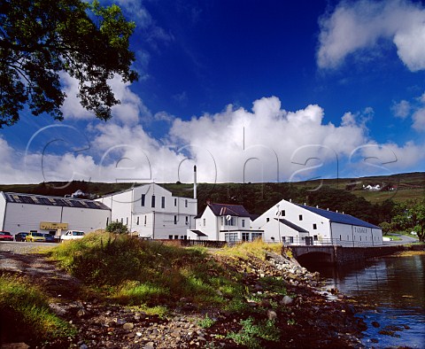 Talisker whisky distillery on the shore of   Loch Harport Carbost Isle of Skye Scotland
