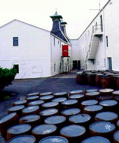 Oak casks in a yard at Lagavulin whisky distillery   Lagavulin Isle of Islay Scotland