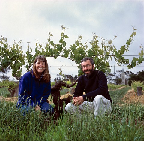 Stephen and Prue Henschke with ancient Shiraz vine in their Hill of Grace vineyard Gnadenberg near Keyneton South Australia     Eden Valley