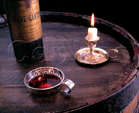 Bottle of Chteau BraneCantenac with tastevin and   candle                    Margaux  Bordeaux