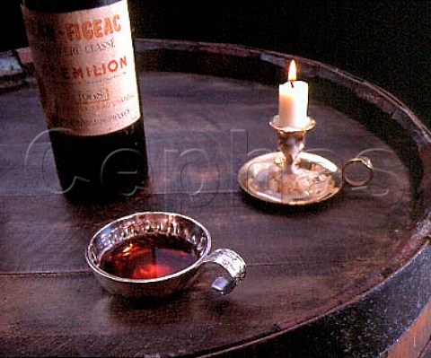 Bottle of Chteau Figeac with tastevin and candle   Stmilion  Bordeaux