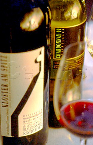 Bottle and glass of Blaufrnkisch and   Chardonnay wine from Weingut Kloster am   Spitz Purbach am Neusiedlersee   Austria Neusiedlersee