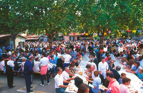 Alfresco diners in the annual autumn   Wine and Food fair Asti Piemonte Italy