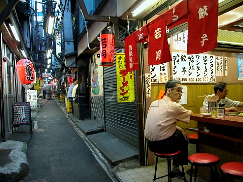 Small opensided izakaya restaurant in   Omoideyokocho Shinjuku Tokyo Japan