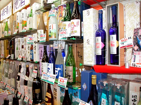 Sake bottles in a small liquor shop in Nagano   Japan
