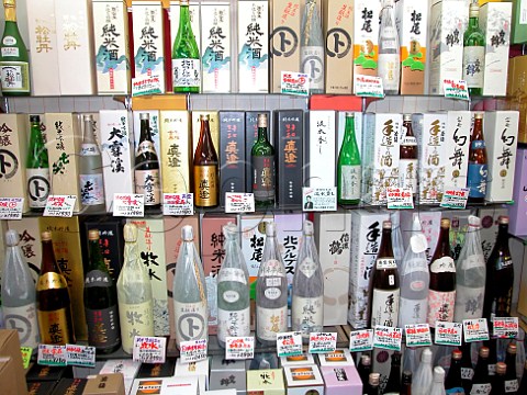 Sake bottles in a small liquor shop in Nagano   Japan