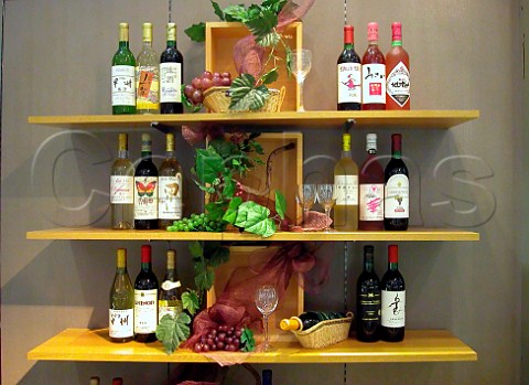 Bottles of local wine on display at an exhibition in   Fujiyoshida Yamanashi prefecture Japan