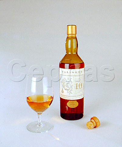 Bottle and glass of Talisker single malt scotch   whisky Carbost Isle of Skye Scotland