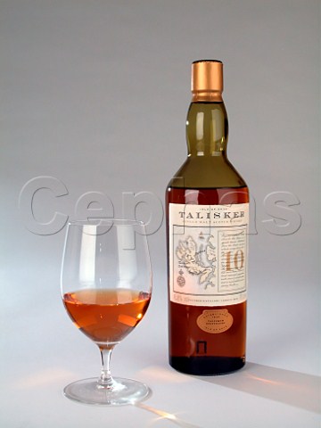 Bottle and glass of Talisker single malt scotch   whisky  Isle of Skye Scotland