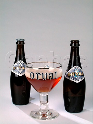 Bottles and glass of Orval trappist beer Belgium
