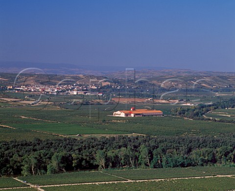 Finca Valpiedra of Martinez Bujanda in a bend of the treelined Rio Ebro with the town of Cenicero beyond La Rioja Spain    Rioja Alta