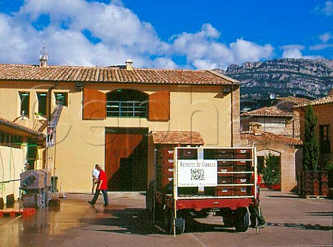 Crates of harvested grapes await unloading alongside   the crate washing machine at the meticulous   gravityfed bodega of Fernando Remrez de Ganuza   Samaniego Alava Spain   Rioja Alavesa