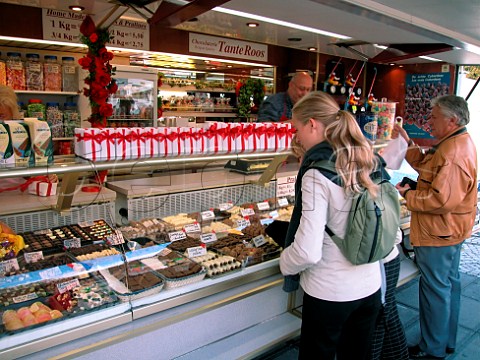 Chocolate stall in Saturday market t Zand Brugge   Belgium
