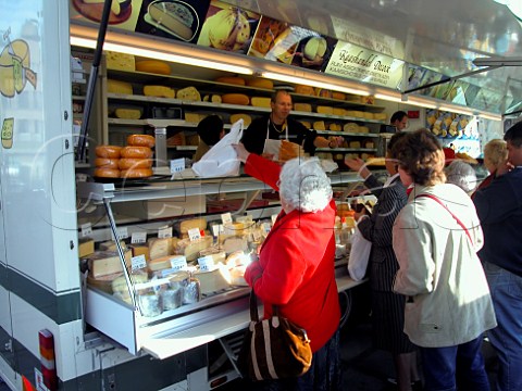 Cheese stall in Saturday market t Zand Brugge   Belgium