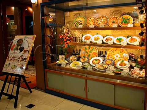 Plastic food in the window display of an Italian   style restaurant on the top floor of a Tokyo   department store  Japan