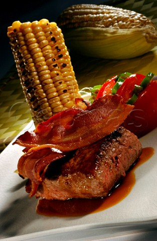 Steak with cornonthecob bacon and peppers