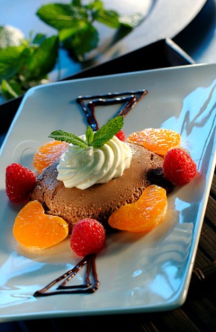 Dessert Chocolate mousse with fruit and cream