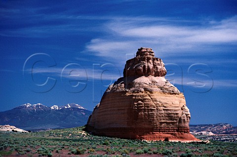 Church Rock with the La Sal Mountains in distance Near Moab Utah USA