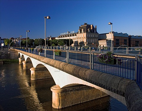 Bridge over the Charente river with Courvoisier   Distillery behind  Jarnac Charente France   Cognac