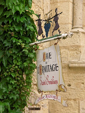 Sign outside Cave de lErmitage one of the many   wine shops in Stmilion Gironde France   Stmilion  Bordeaux
