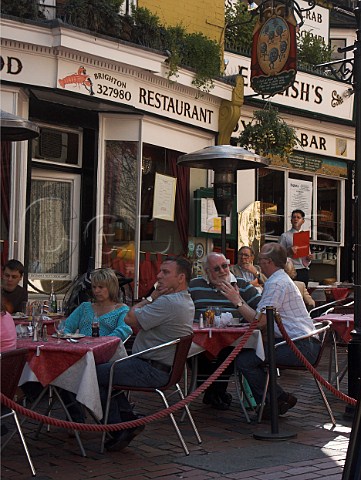 Outdoor seating at one of the many fish restaurants  in Brighton East Sussex England