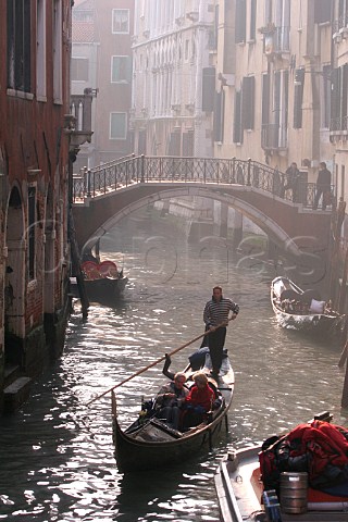 Gondola on canal Venice Italy
