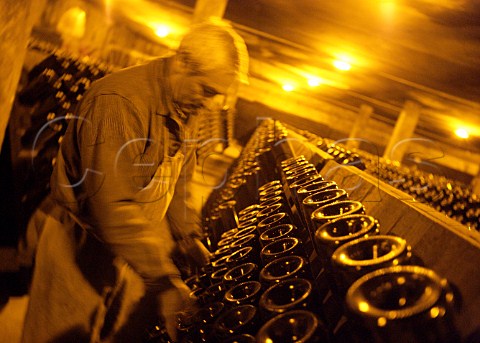 Performing the remuage in cellars of Champagne   Salon Le MesnilsurOger Marne France