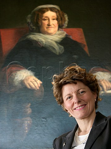 Cecile Bonnefond President of Champagne Veuve Clicquot Ponsardin below the  portrait of the widow   Cliquot   Reims Marne France