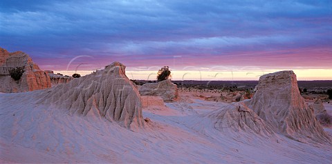 Dusk falls over The Walls of China eroded clay   formations in Mungo National Park New South Wales    Australia