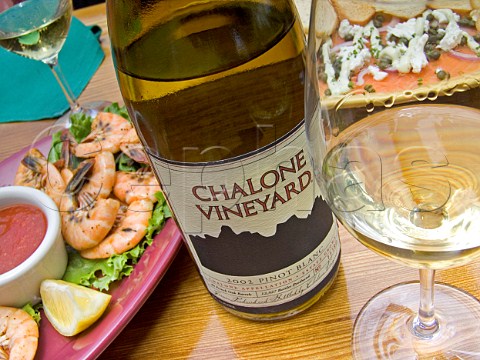 Bottle and glass showing tears of Chalone Vineyard   Pinot Blanc   California