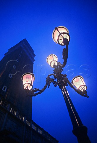 Street lights at the foot of the Piazza San Marco   tower Venice Italy