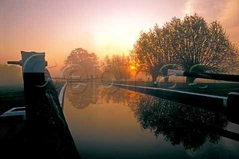 Sunrise over Papercourt Lock River Wey Surrey UK